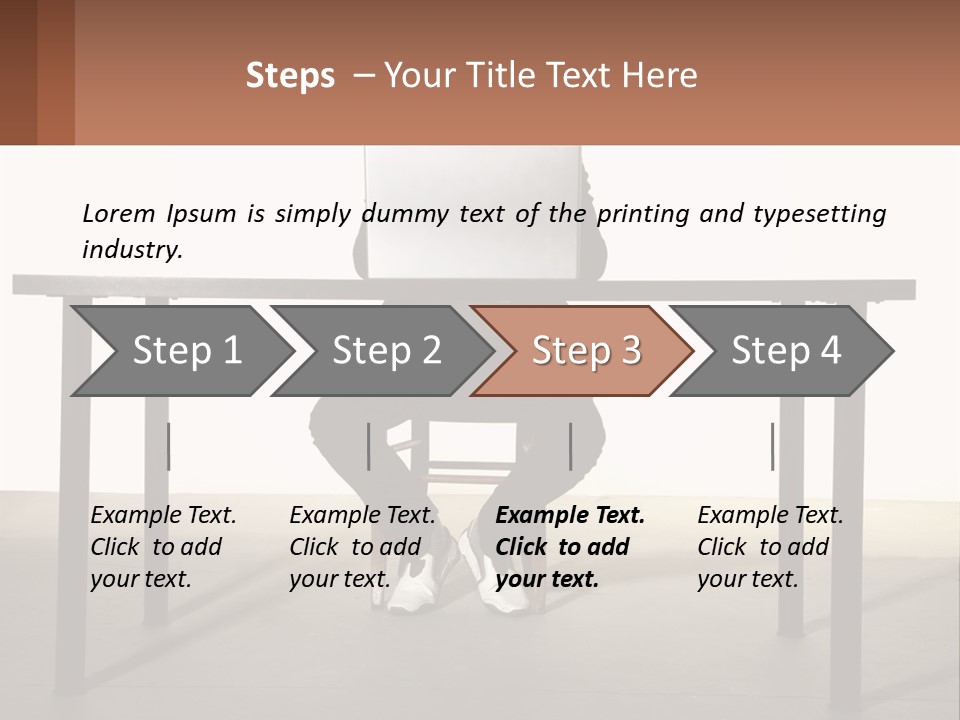 A Man Sitting At A Table Using A Laptop Computer PowerPoint Template