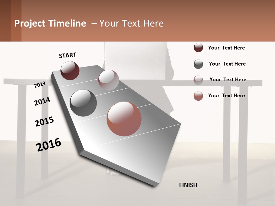A Man Sitting At A Table Using A Laptop Computer PowerPoint Template