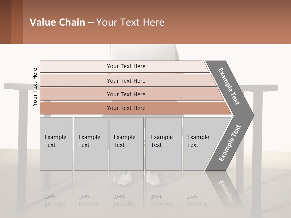 A Man Sitting At A Table Using A Laptop Computer PowerPoint Template