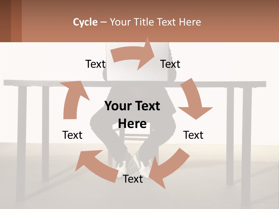 A Man Sitting At A Table Using A Laptop Computer PowerPoint Template