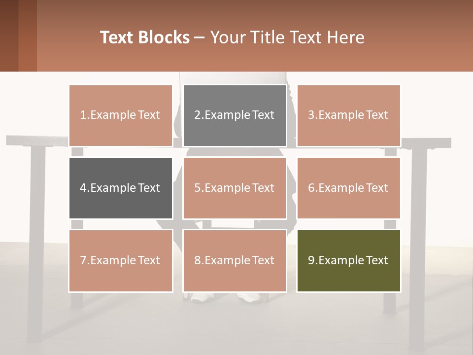 A Man Sitting At A Table Using A Laptop Computer PowerPoint Template
