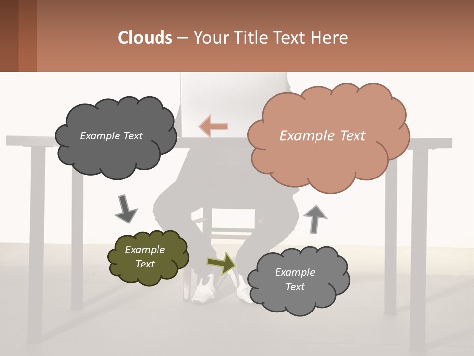 A Man Sitting At A Table Using A Laptop Computer PowerPoint Template