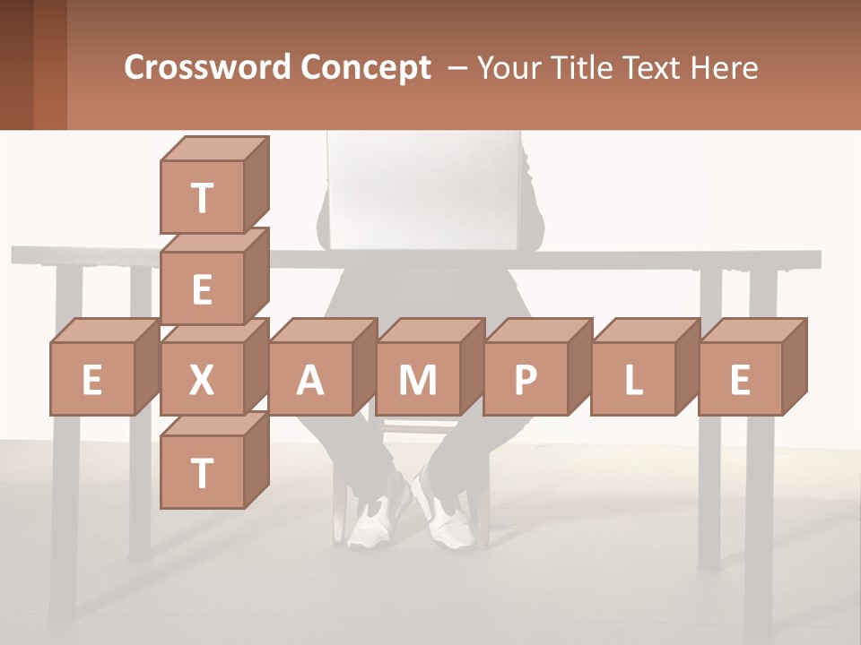 A Man Sitting At A Table Using A Laptop Computer PowerPoint Template