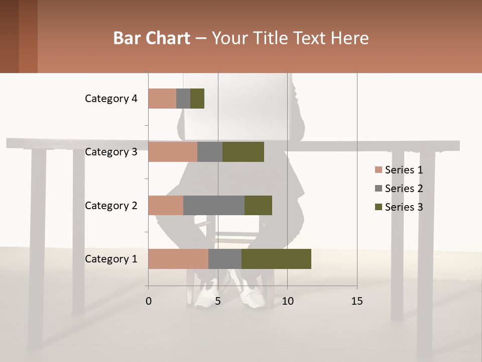 A Man Sitting At A Table Using A Laptop Computer PowerPoint Template