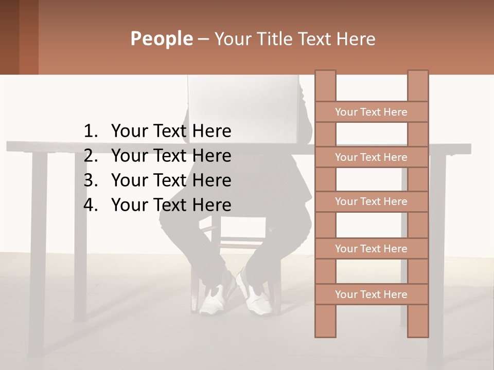 A Man Sitting At A Table Using A Laptop Computer PowerPoint Template