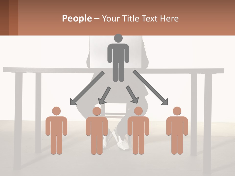 A Man Sitting At A Table Using A Laptop Computer PowerPoint Template