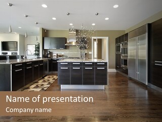 A Large Kitchen With A Center Island And Stainless Steel Appliances PowerPoint Template