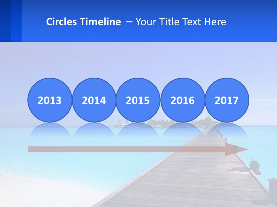 A Pier Leading Into The Ocean With A Boat In The Distance PowerPoint Template