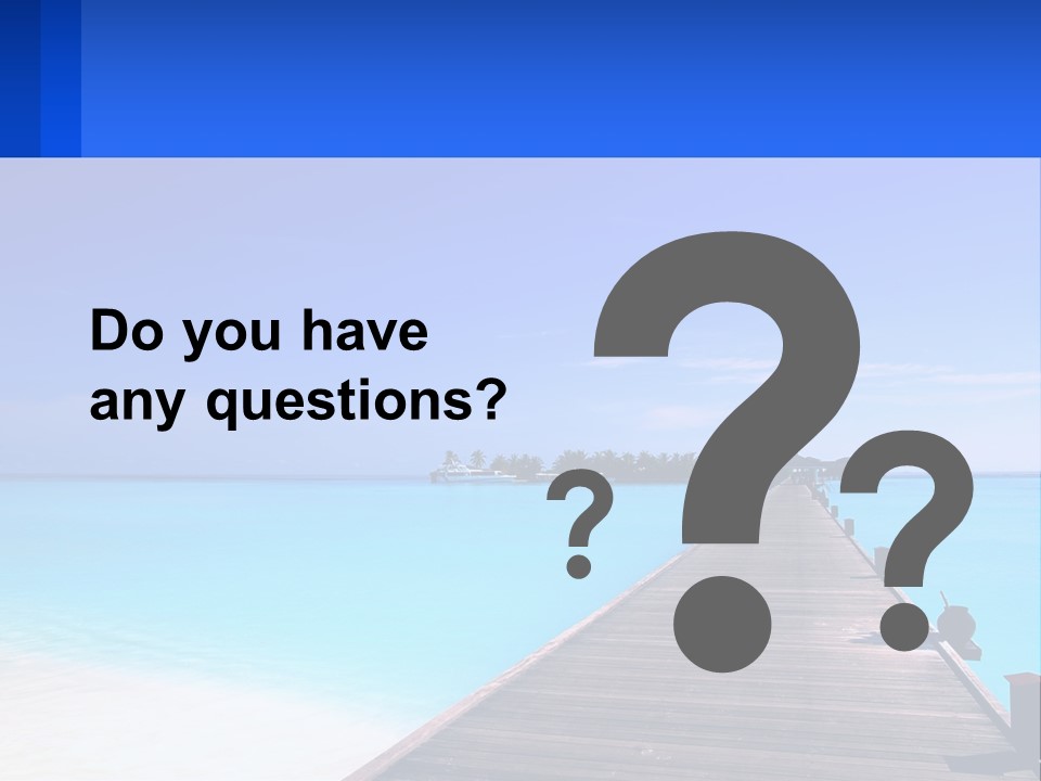 A Pier Leading Into The Ocean With A Boat In The Distance PowerPoint Template