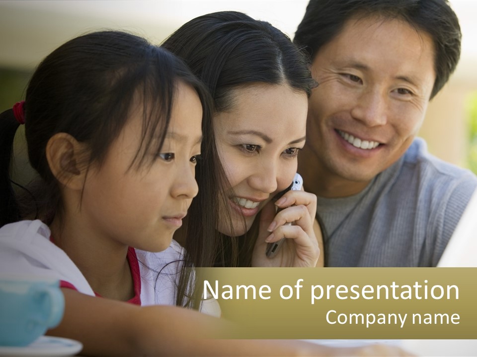 A Man And Two Girls Looking At A Computer Screen PowerPoint Template