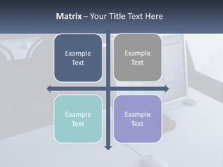 A Computer Monitor Sitting On Top Of A Desk PowerPoint Template
