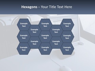 A Computer Monitor Sitting On Top Of A Desk PowerPoint Template