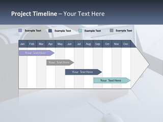 A Computer Monitor Sitting On Top Of A Desk PowerPoint Template