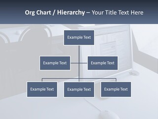 A Computer Monitor Sitting On Top Of A Desk PowerPoint Template