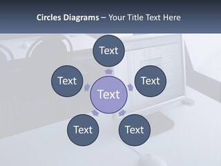 A Computer Monitor Sitting On Top Of A Desk PowerPoint Template
