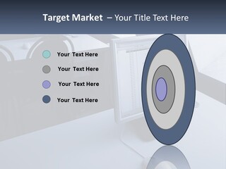 A Computer Monitor Sitting On Top Of A Desk PowerPoint Template