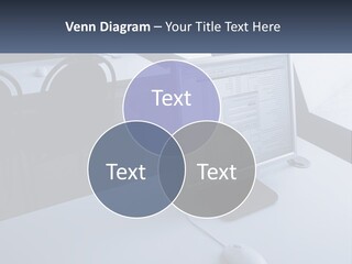 A Computer Monitor Sitting On Top Of A Desk PowerPoint Template