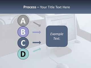 A Computer Monitor Sitting On Top Of A Desk PowerPoint Template