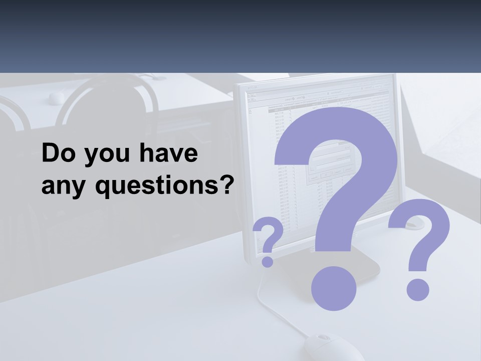 A Computer Monitor Sitting On Top Of A Desk PowerPoint Template