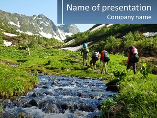 A Group Of People Walking Across A Lush Green Field PowerPoint Template