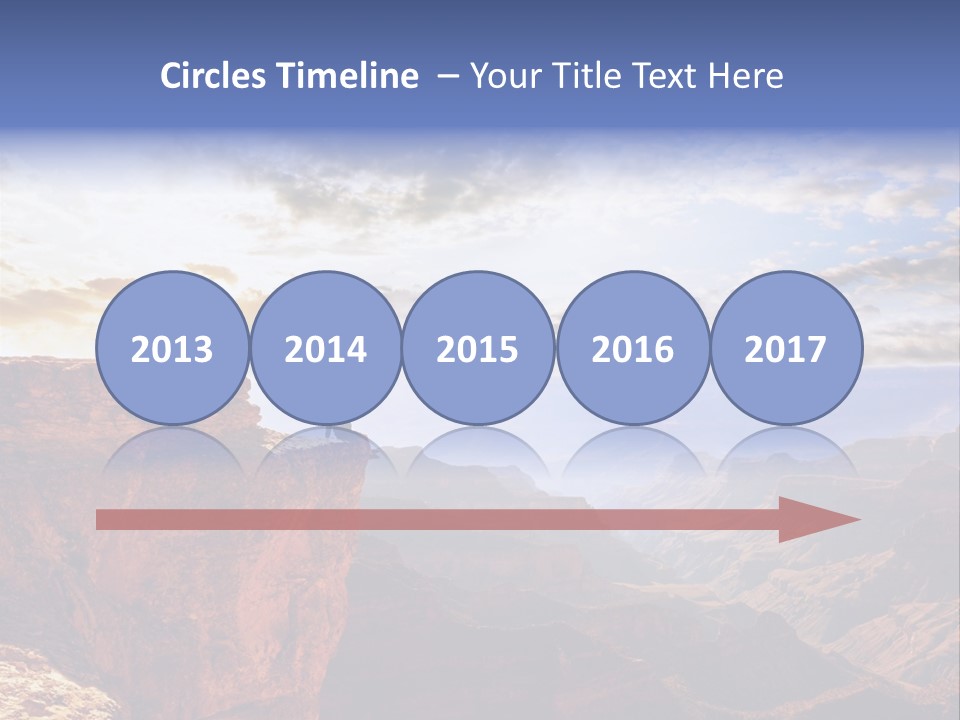 A Person Sitting On Top Of A Cliff Overlooking A Canyon PowerPoint Template