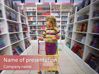 A Little Girl Pushing A Shopping Cart In A Library PowerPoint Template