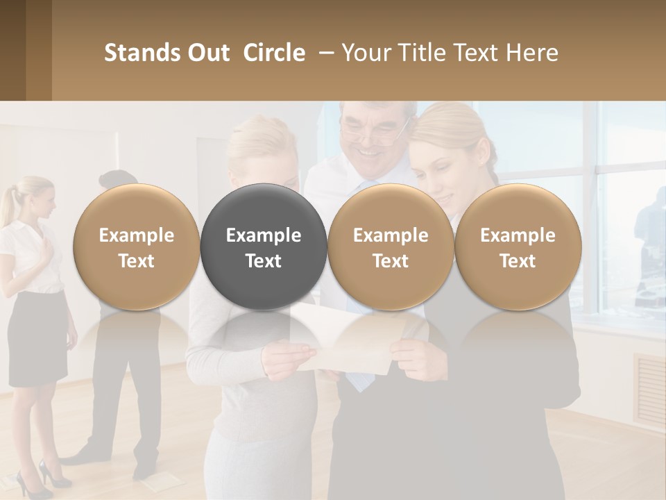 A Group Of Business People Looking At A Piece Of Paper PowerPoint Template
