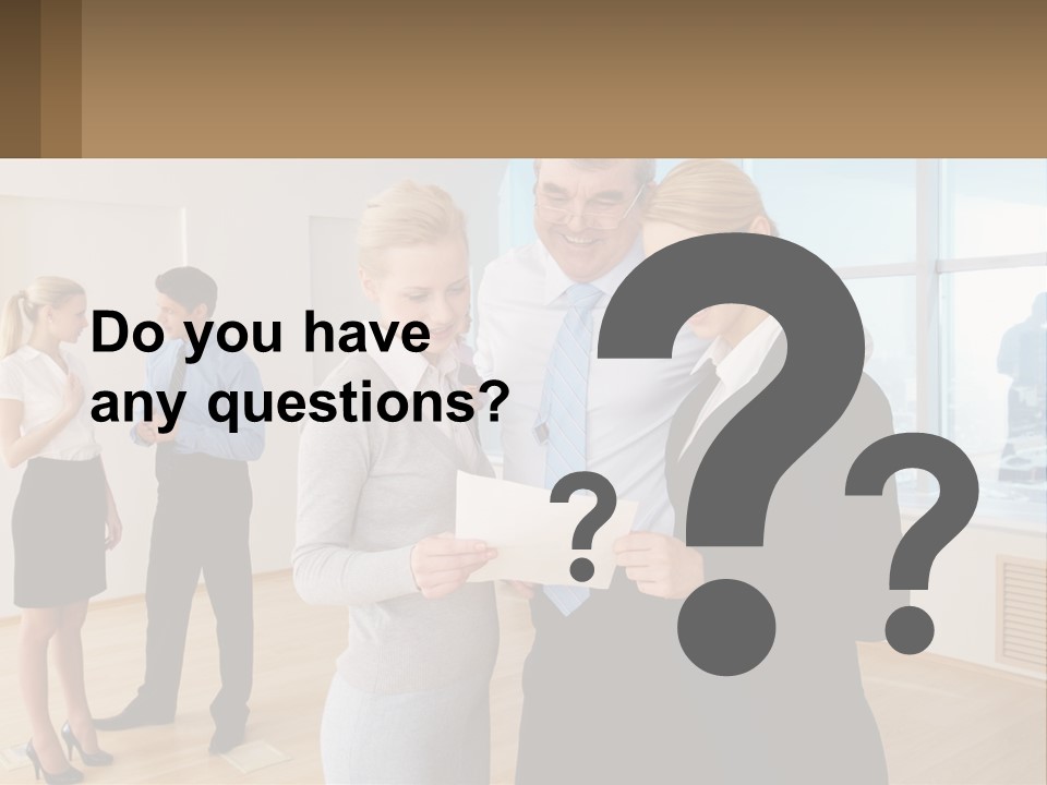 A Group Of Business People Looking At A Piece Of Paper PowerPoint Template