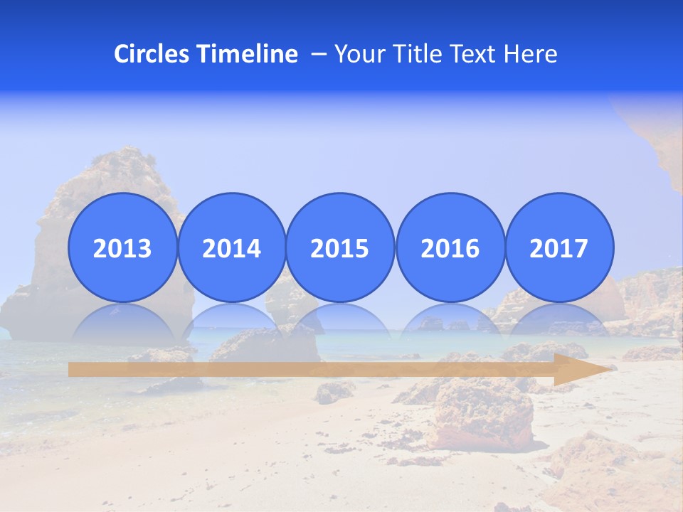 A Rocky Beach With A Rock Formation In The Background PowerPoint Template