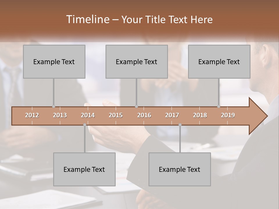 A Group Of Business People Sitting Around A Table PowerPoint Template