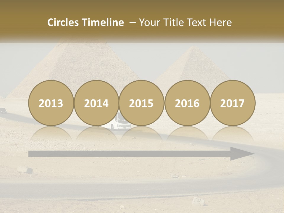 A Bus Driving Down A Road In Front Of Three Pyramids PowerPoint Template