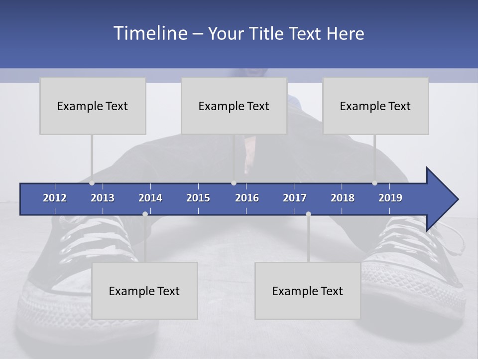 A Man Sitting On The Floor With His Feet Up PowerPoint Template