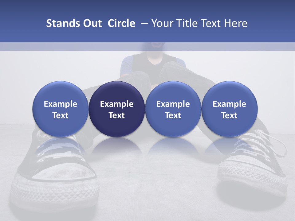 A Man Sitting On The Floor With His Feet Up PowerPoint Template