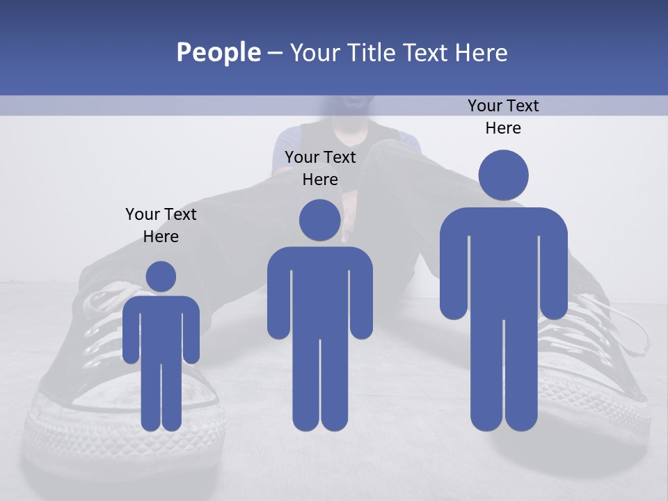 A Man Sitting On The Floor With His Feet Up PowerPoint Template