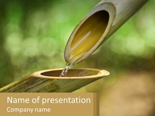 A Drop Of Water Coming Out Of A Wooden Bowl PowerPoint Template