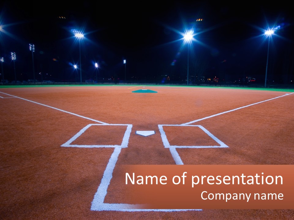 A Baseball Field At Night With Lights On It PowerPoint Template