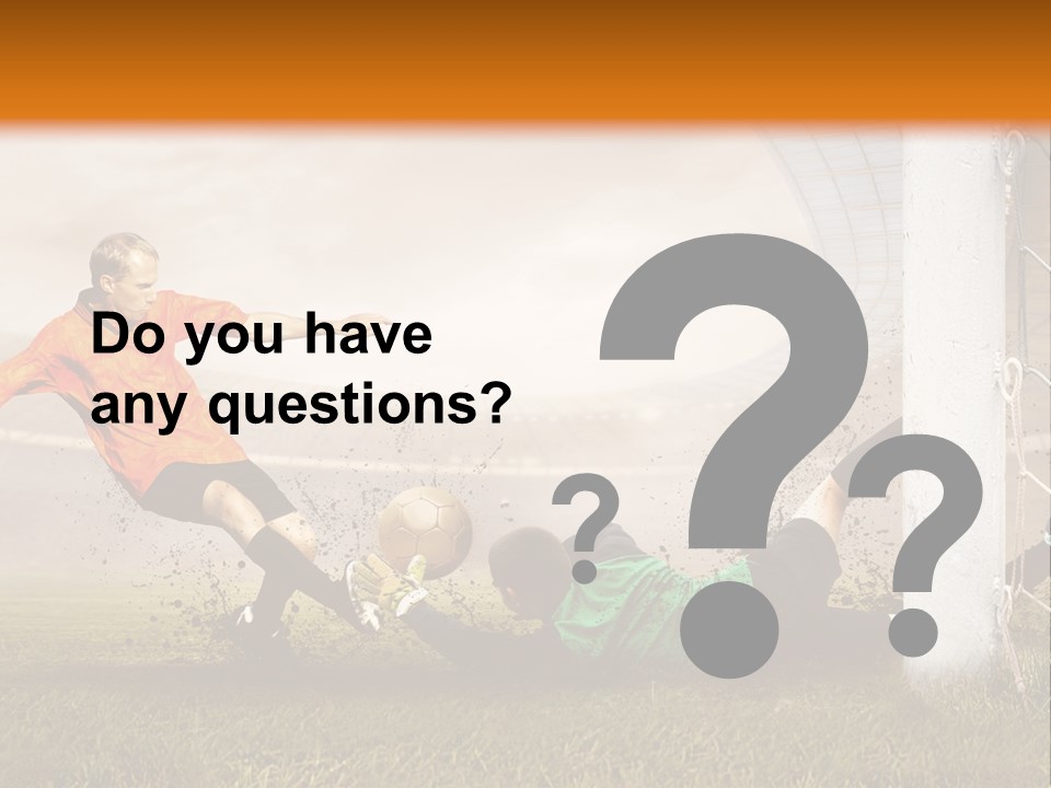 A Soccer Player Is Kicking The Ball Towards The Goal PowerPoint Template