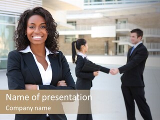 Two Business People Shaking Hands In Front Of A Building PowerPoint Template