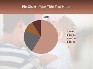 A Man Holding A Baby And Smiling At The Camera PowerPoint Template