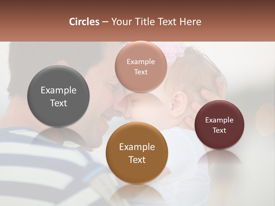 A Man Holding A Baby And Smiling At The Camera PowerPoint Template