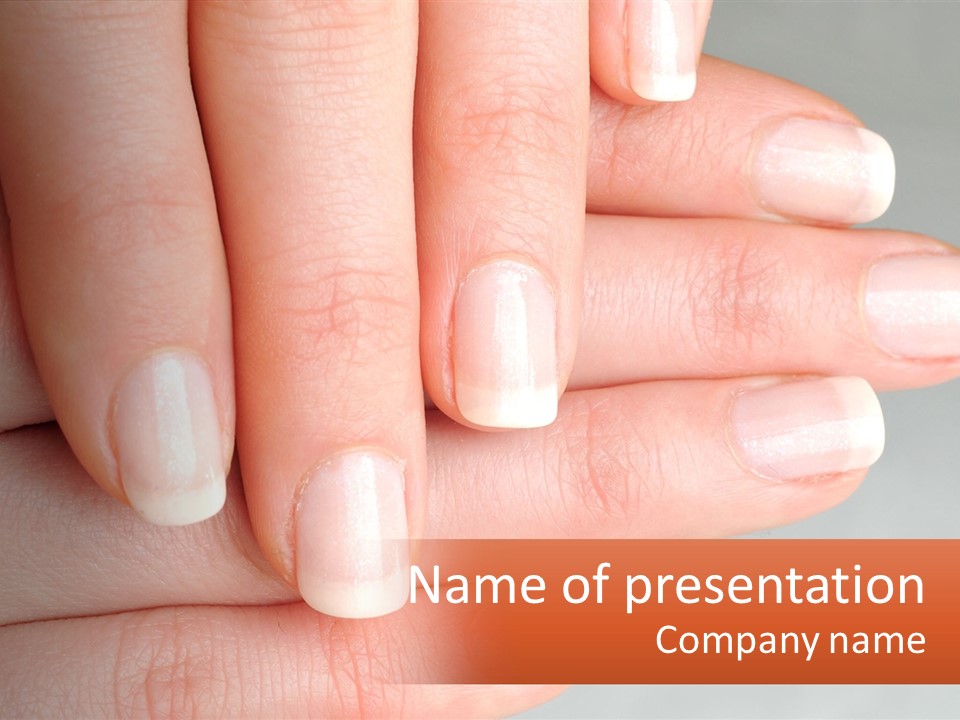 A Woman's Hand With A White Manicure On It PowerPoint Template