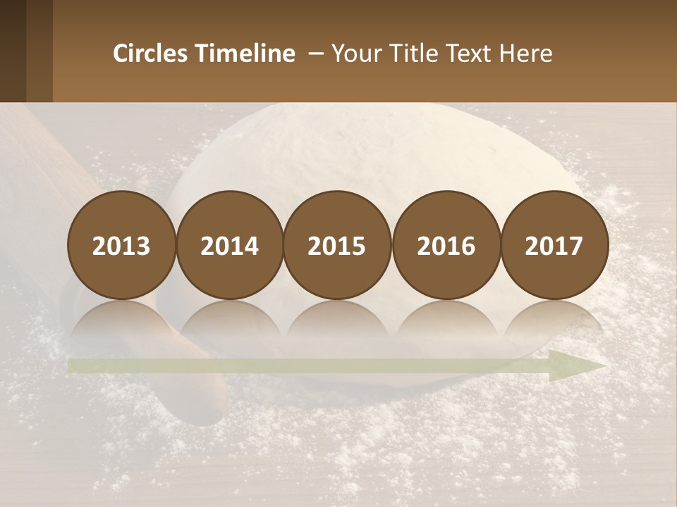 A Ball Of Dough Next To A Rolling Pin On A Table PowerPoint Template