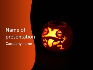 A Pumpkin With A Frog Carved Into It PowerPoint Template