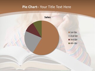 A Little Girl Is Reading A Book On A Table PowerPoint Template