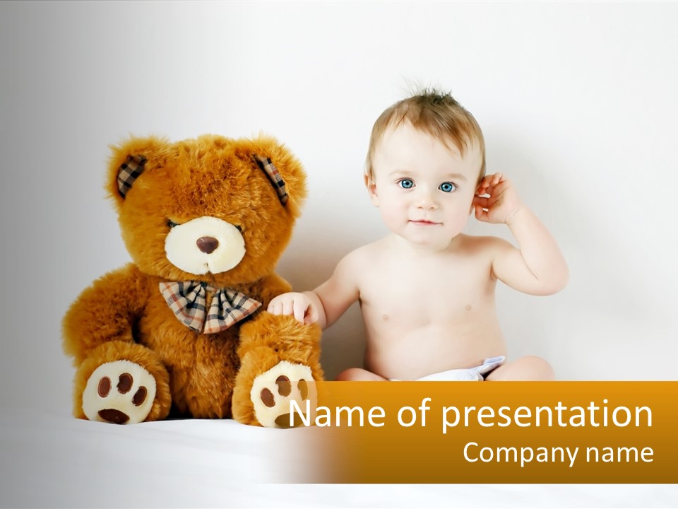 A Baby Sitting Next To A Teddy Bear PowerPoint Template