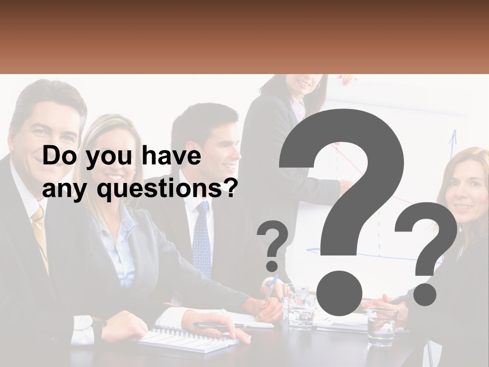 A Group Of Business People Sitting At A Table PowerPoint Template