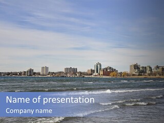 A Large Body Of Water With A City In The Background PowerPoint Template