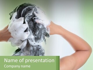 A Woman Is Holding Her Hair With A Lot Of Soap On It PowerPoint Template