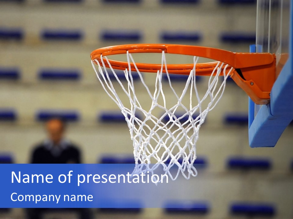 A Basketball Going Through The Net Of A Basketball Court PowerPoint Template