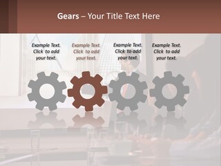 A Man Giving A Presentation To A Group Of People PowerPoint Template